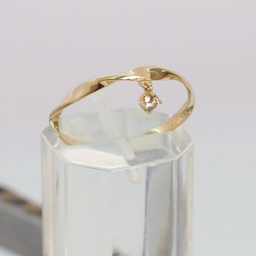 The Dangling Brown Diamond Golden Twist Ring