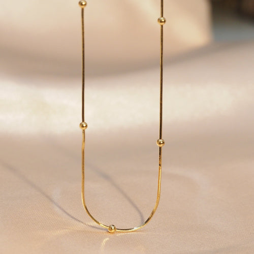 Golden Dot Snake Necklace